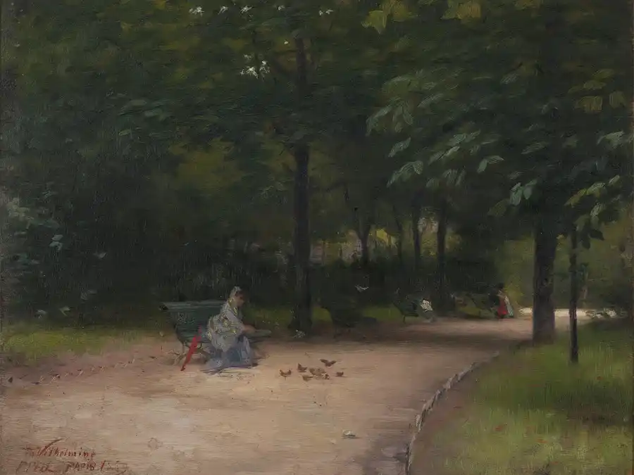 Mujer alimentando aves en un parque sereno.