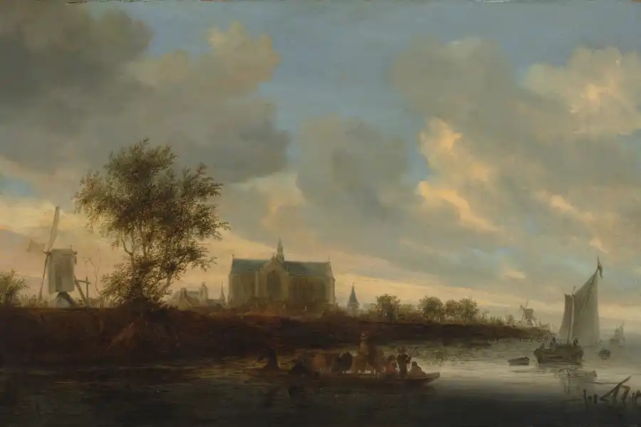 Veduta della città di Alkmaar con nuvole e riflessi sull'acqua.