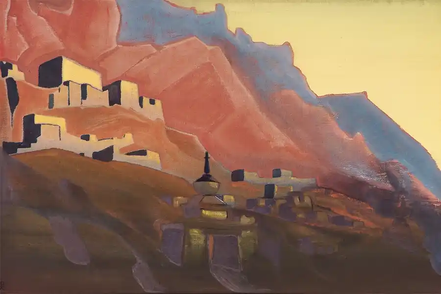 Landschap van Ladakh met een zonsondergang en een dorp.