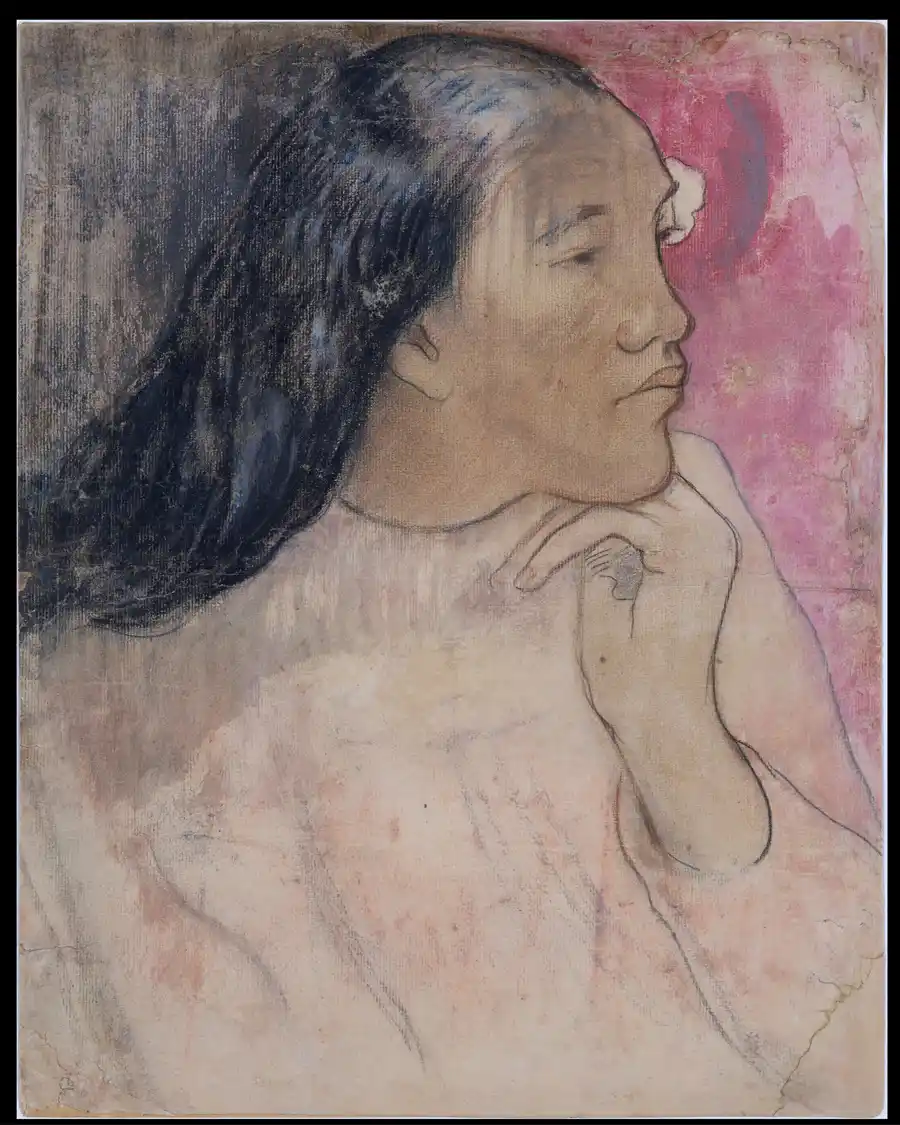 Portrait of a Tahitian woman with a flower in her hair.