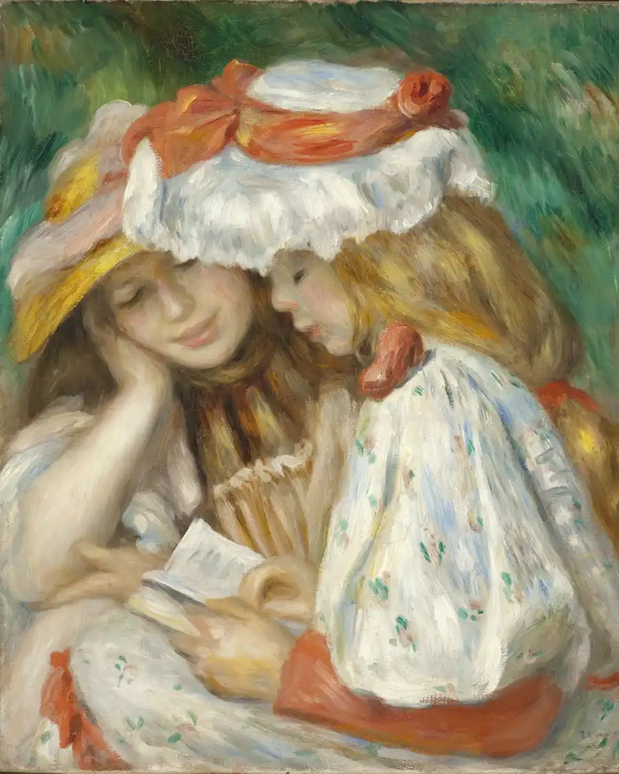 Two girls reading together in a lush green setting.